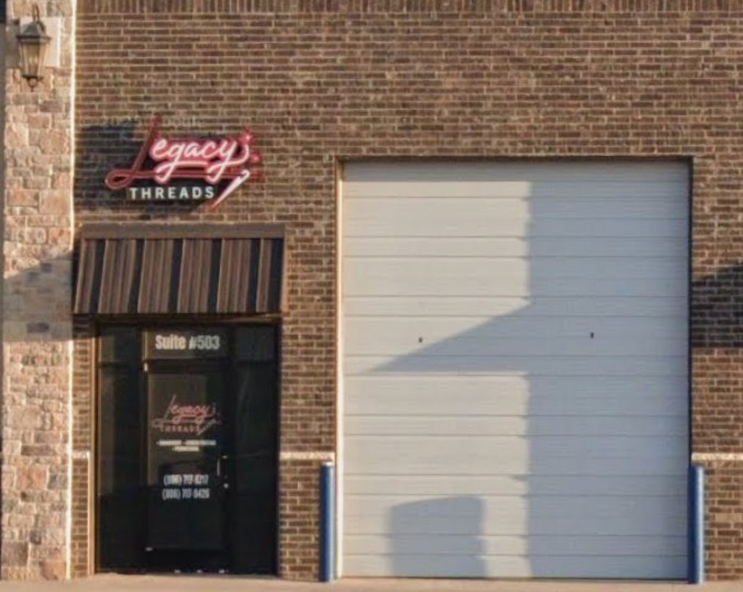 Legacy Threads storefront with neon sign and Suite 503 door from a public shop photo